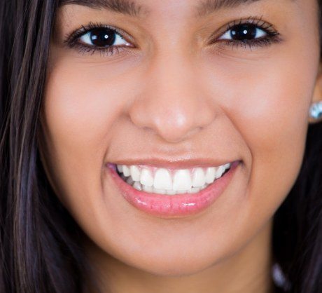 Woman sharing flawless smile as part of virtual smile design process