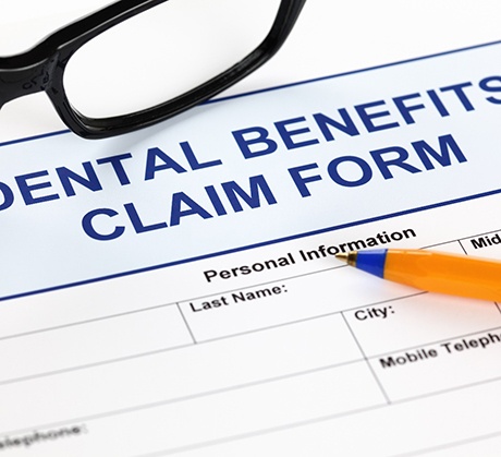 Close-up of a claim form for dental benefits